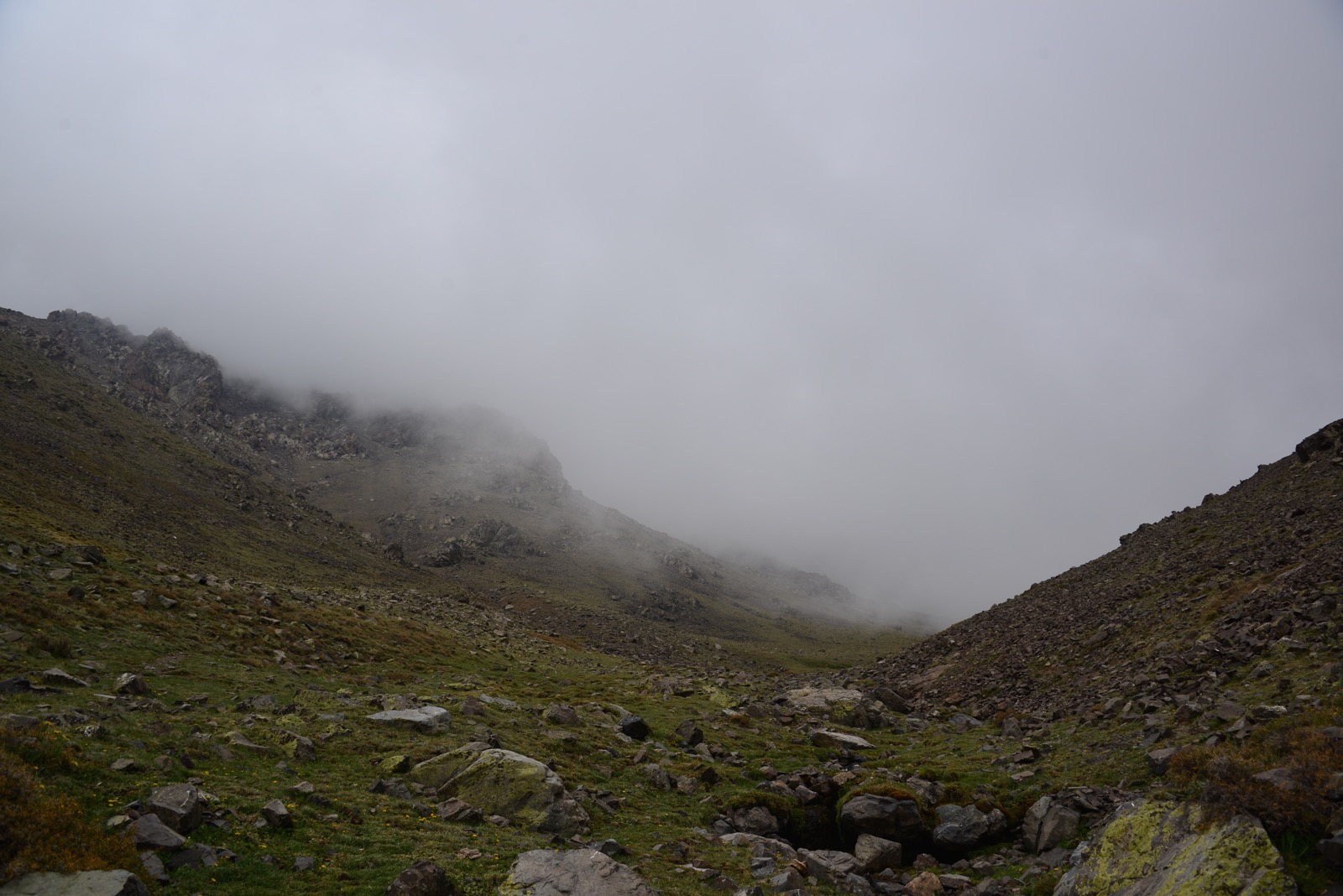 Somewhere in this fog there's a peak… our destination/
