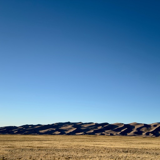 Dunes with the afternoon sun/
		    9562 CO-150, Mosca, CO 81146, USA