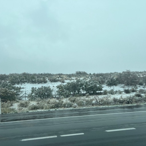 Snow on I-15 N heading back to the airport/
		    