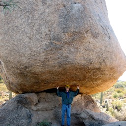 Holding up the boulder/
		    