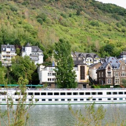 A tourist barge as long as an entire village/
		    