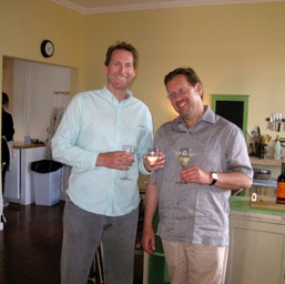 Derek and Dan enjoying a pre-cheese glass of wine/
		    