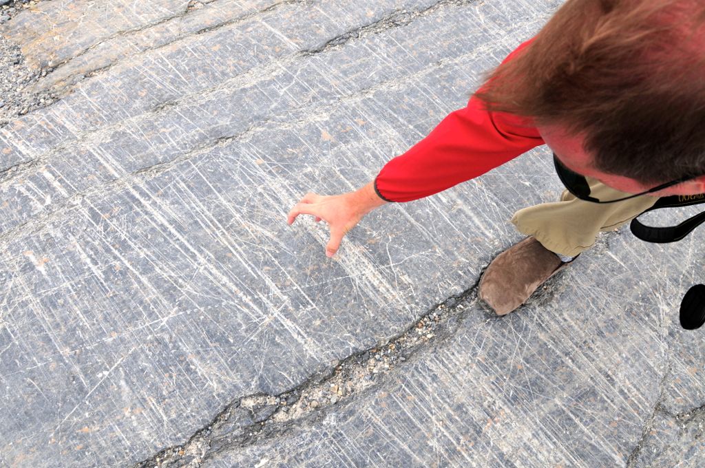 Scratches made by the glaciers moving slooooooowly/