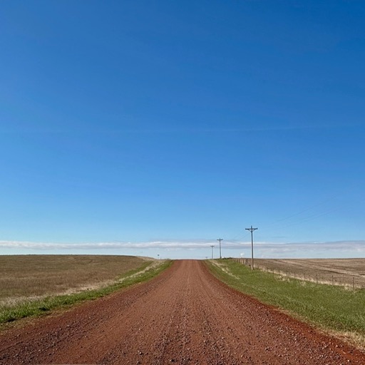 Apple Maps decided we should exit the interstate and take this road instead/
		    623 Yates Rd E, Wibaux, MT 59353, USA