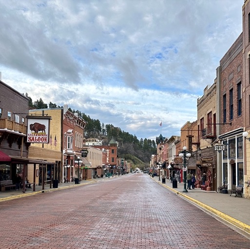 Main St. in Deadwood: nothing but bars and brothles/
		    664 Main St, Deadwood, SD 57732, USA