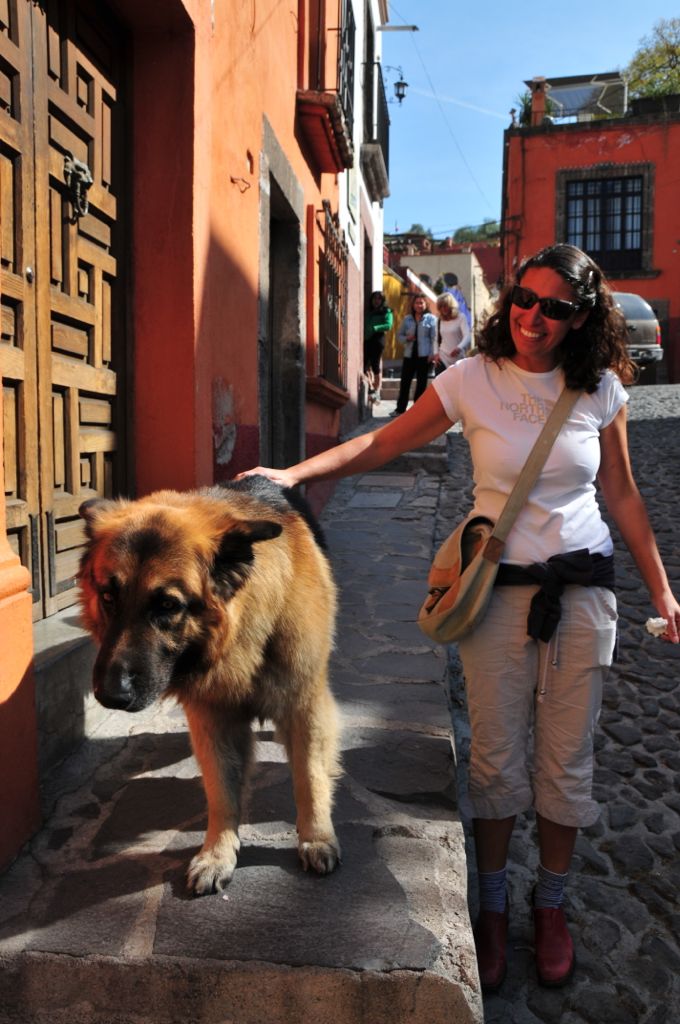 Assana always finds a pup to pet.../