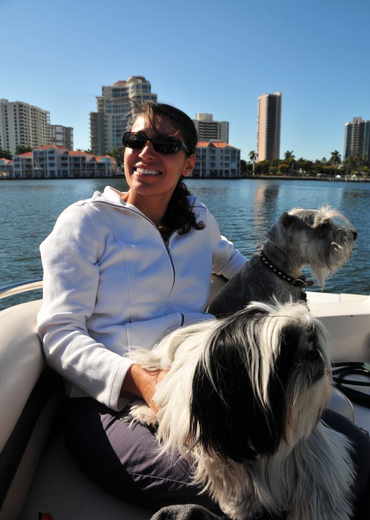 Assana covered with dogs/