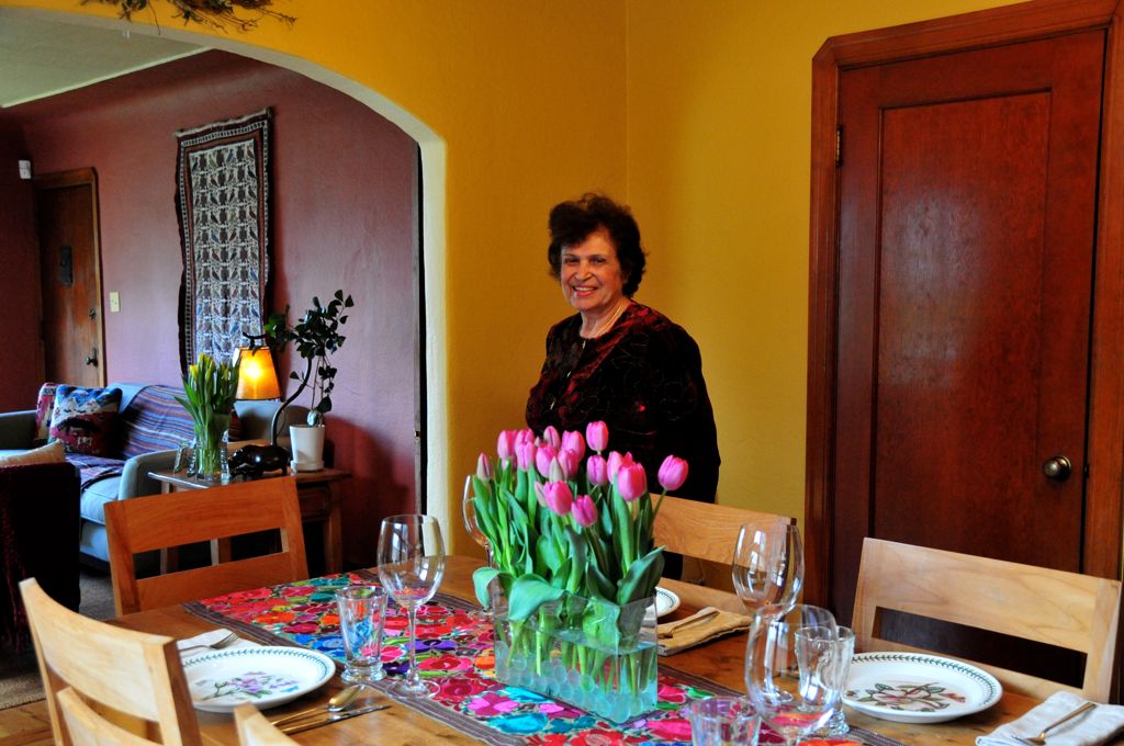 Mom checking out the table/