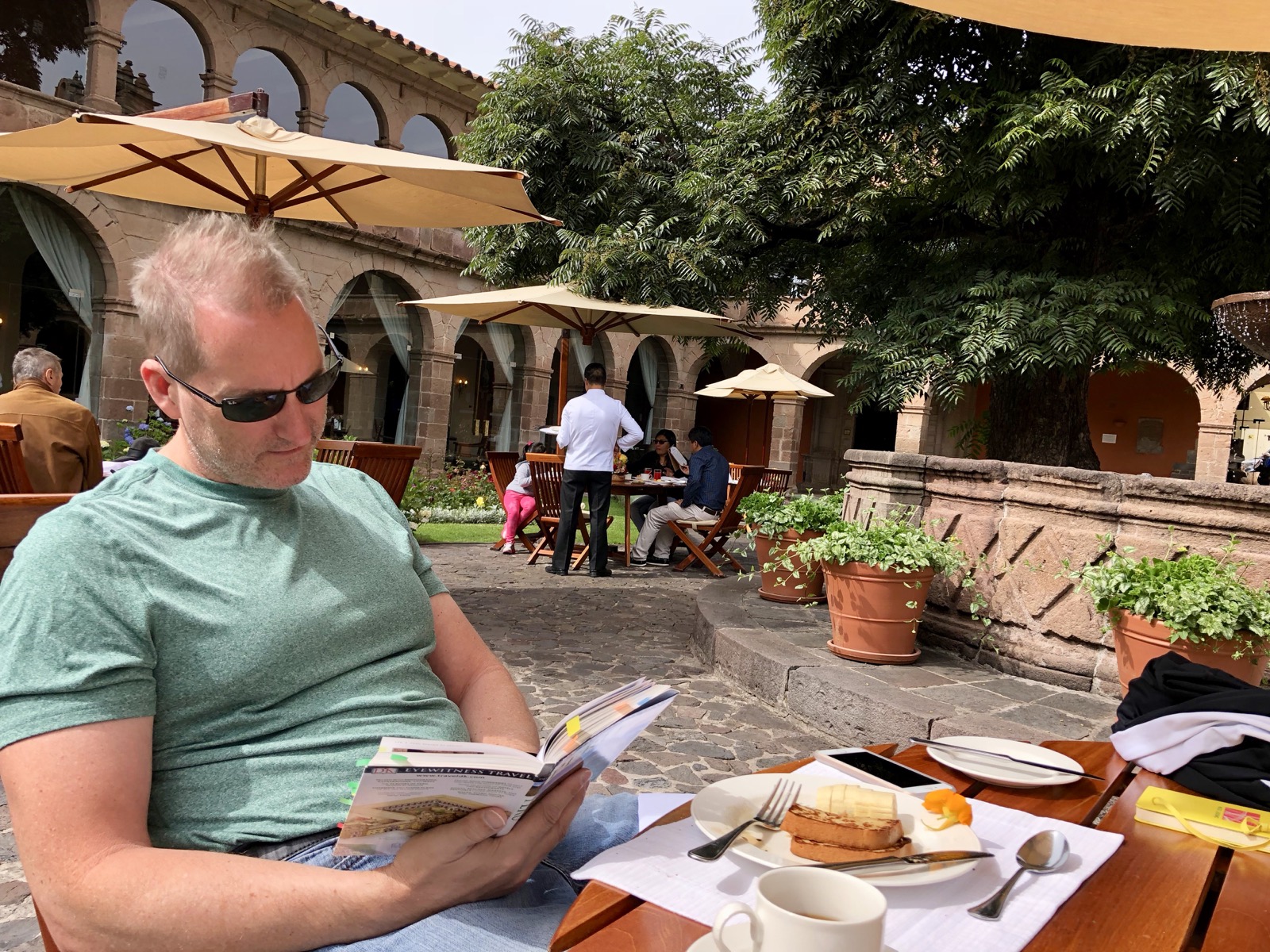 Planning out the day while having breakfast in the beautiful courtyard/