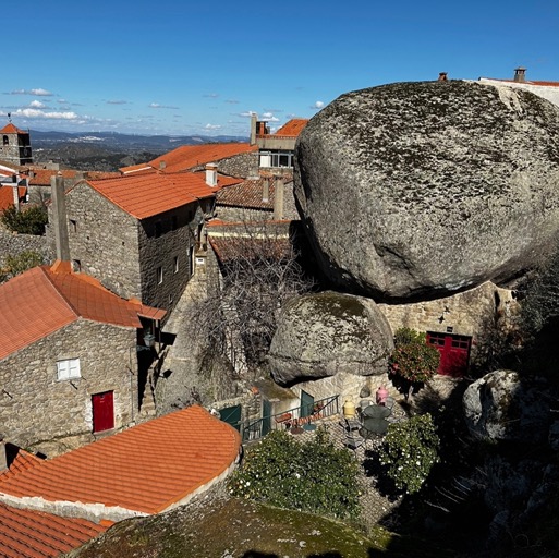 Big ass boulder acting as the roof to a restaurant in Monsanto/
		    R. do Castelo 20, 6060-091 Monsanto, Portugal