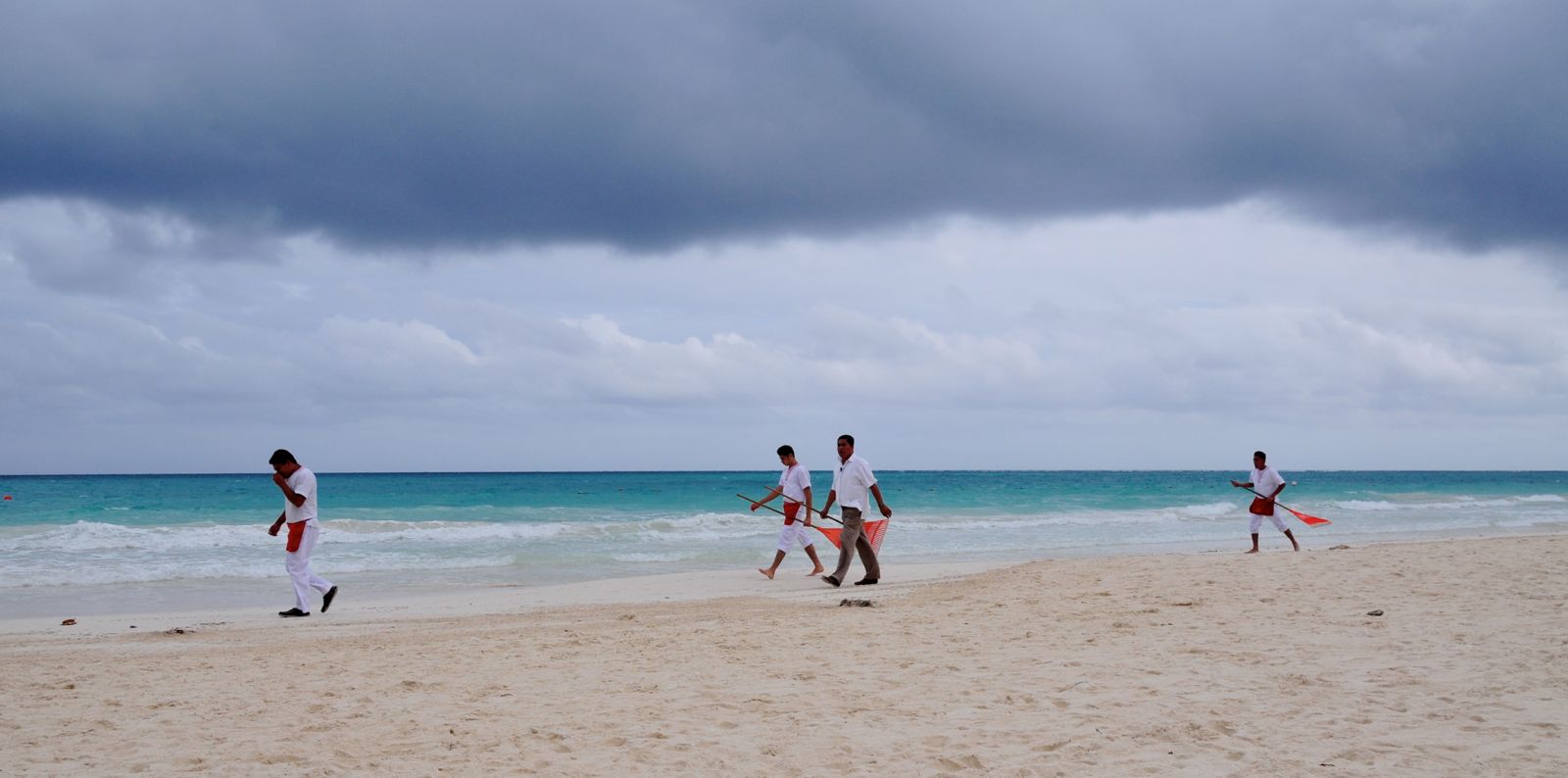 The beach crew raking the beach... again!/