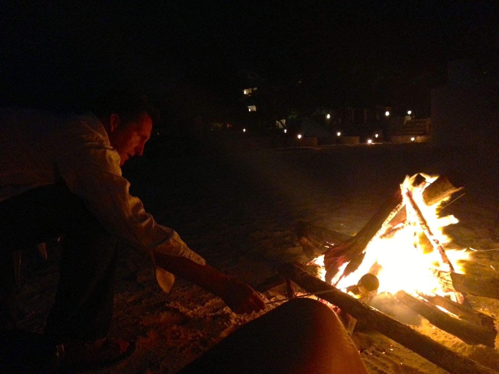 Dan poking our after-dinner fire.../