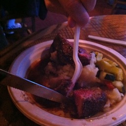 Fancy dinner on paper plates with a disposable fork, but a real knife!/
		    
