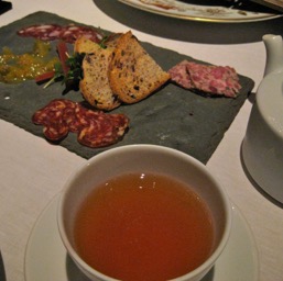 Charcuterie and beer served in a tea-cup/
		    