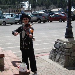 Violin dude in Old Town Truckee/
		    