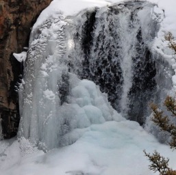 Snow on the frozen waterfall/
		    
